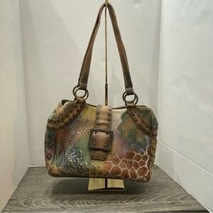 Anuschka Leather Shoulder Bag. Hand painted animal print. Used. Some flaws.